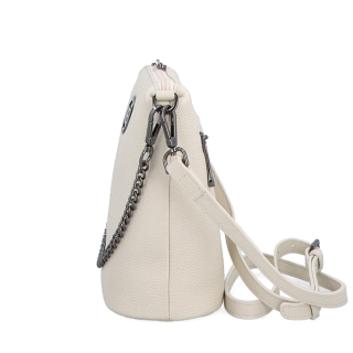 Malá kožená crossbody kabelka s výrazným řetízkem Noelia Bolger materiál kůže zapínání na zip barva béžová velikost malá NB 3016 K Z boku