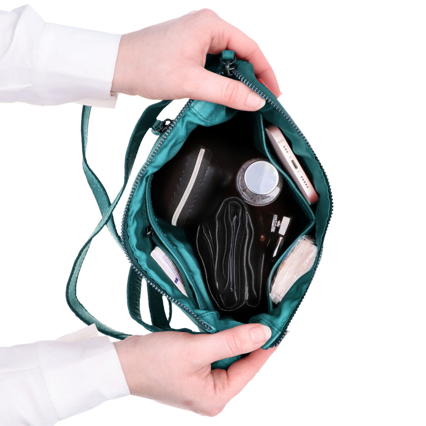 Kožená crossbody kabelka s moderním designem Noelia Bolger materiál kůže zapínání na zip barva tyrkysová velikost malá NB 2400 TYR Vnitřek