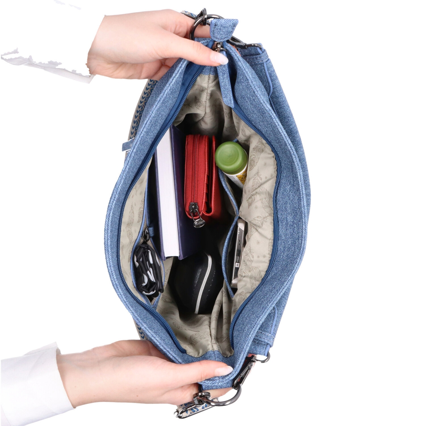 Prostorná crossbody kabelka s květinovým vzorem Indee materiál syntetická kůže zapínání na zip barva modrá velikost střední 6337 M Vnitřek