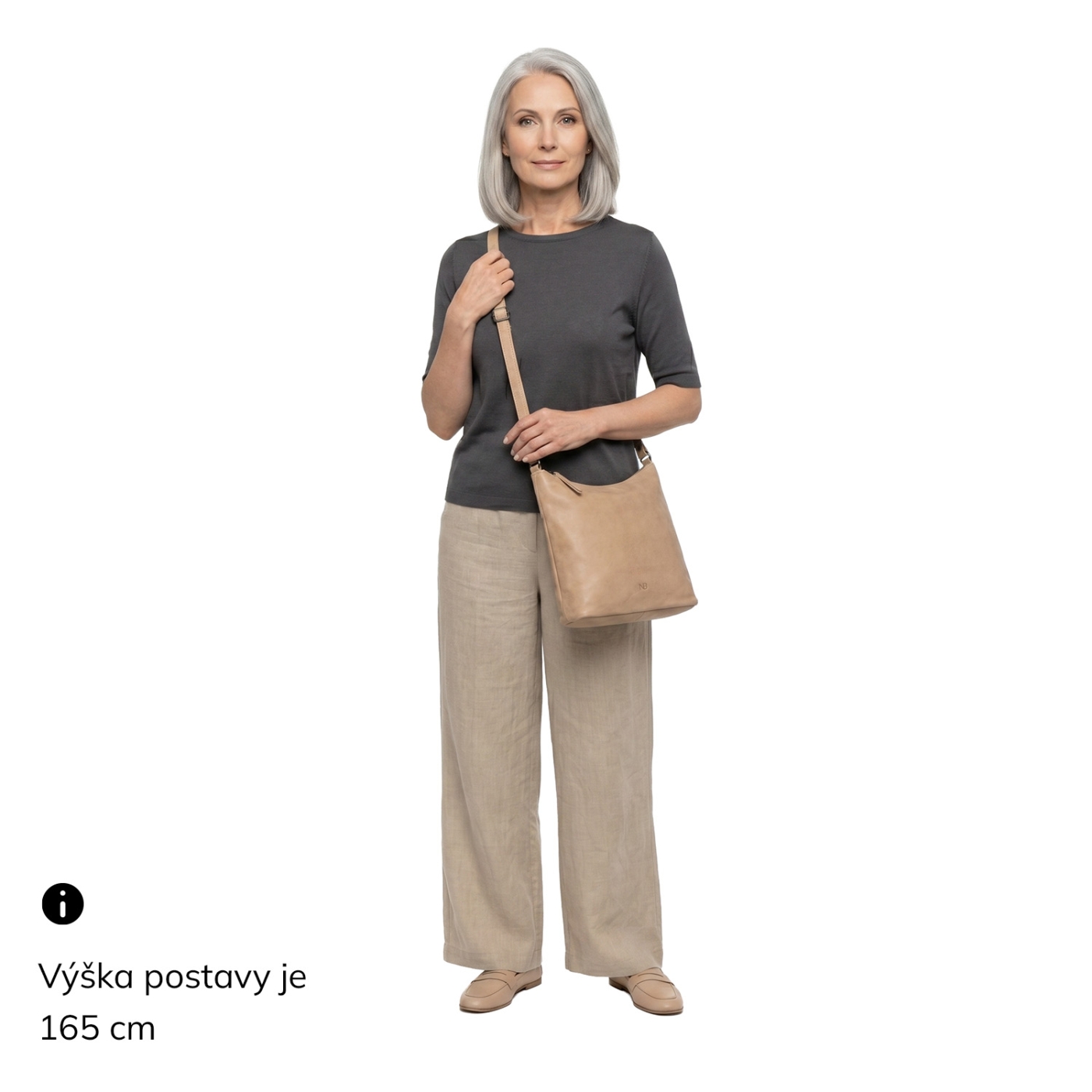 Nadčasová kožená kabelka přes rameno Noelia Bolger materiál kůže zapínání na zip barva béžová velikost střední NB 2405 BE Na postavě