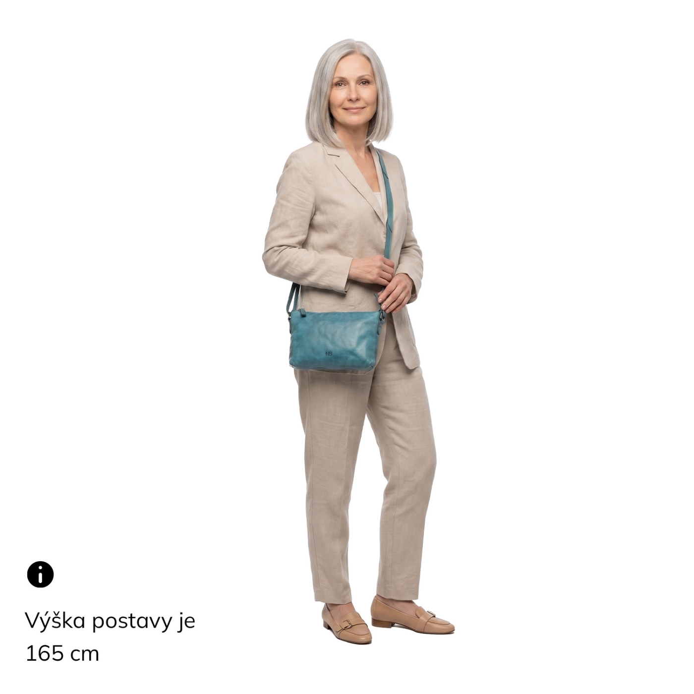 Kožená crossbody s čistými liniemi Noelia Bolger materiál kůže zapínání na zip barva tyrkysová velikost malá NB 2414 TYR Na postavě