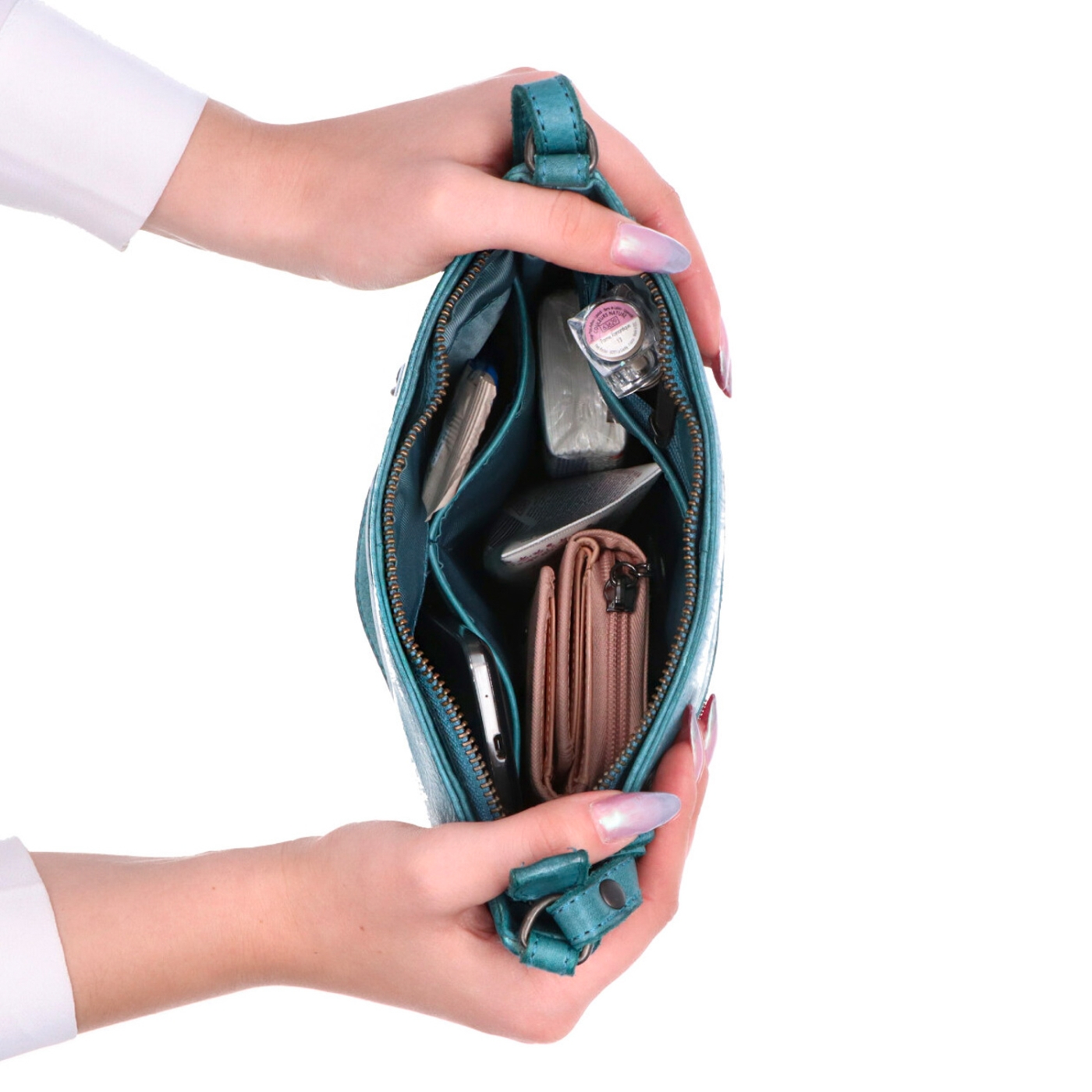 Kožená crossbody kabelka pro každý den Noelia Bolger materiál kůže zapínání na zip barva tyrkysová velikost malá NB 2404 TYR Vnitřek