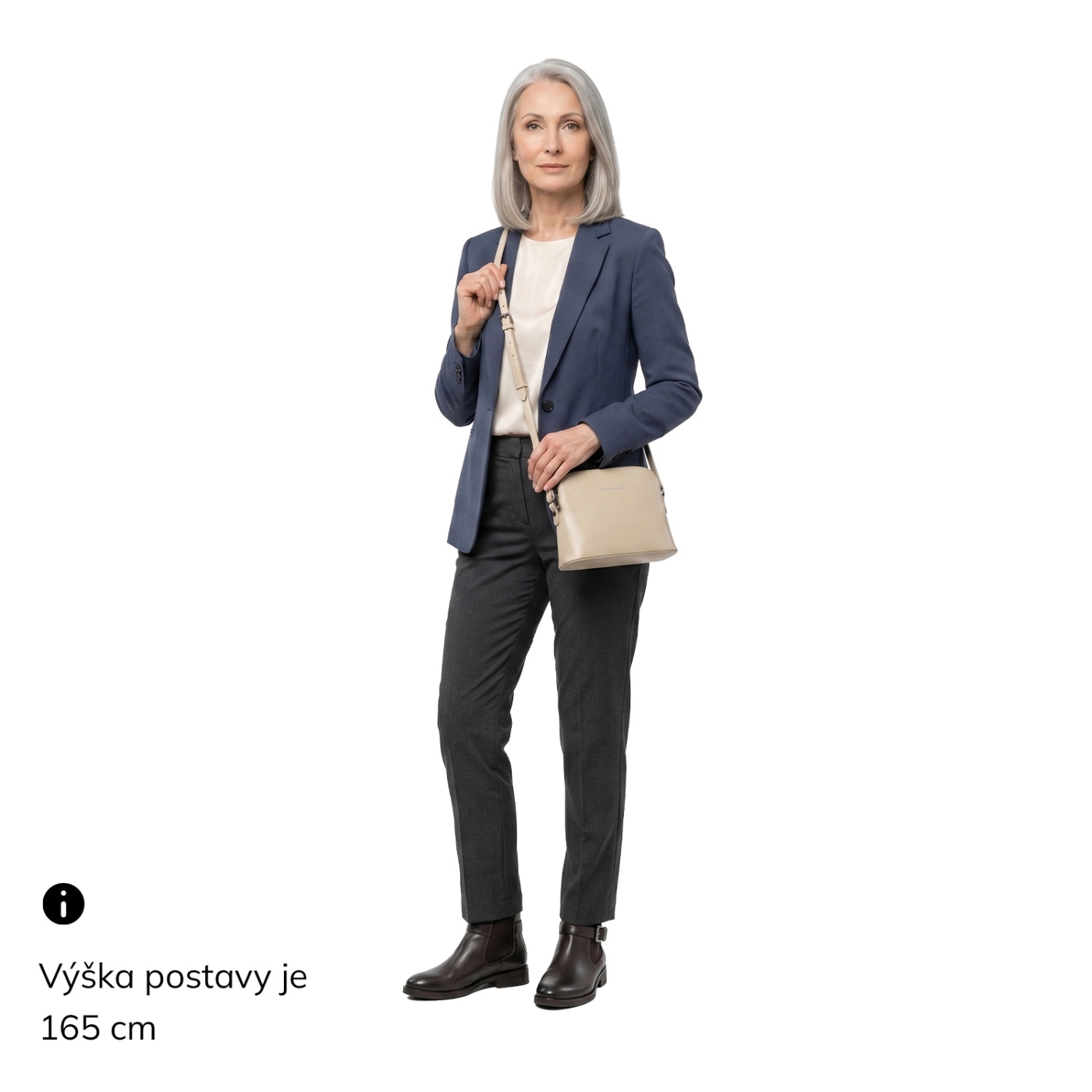 Luxusní malá kožená crossbody kabelka Noelia Bolger materiál kůže zapínání na zip barva béžová velikost malá NB 0080 BE Na postavě